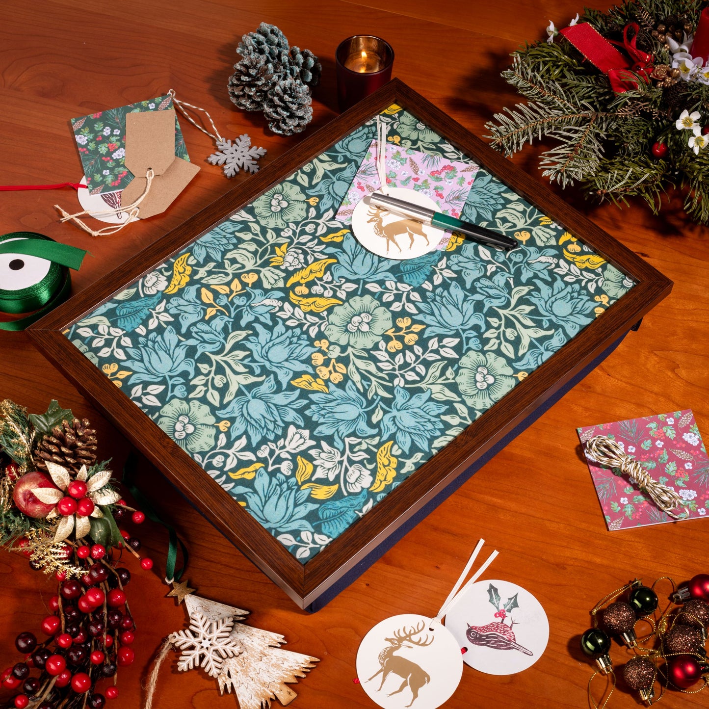 Lifestyle view of William Morris Mallow Teal lap tray on sofa with food and drink
