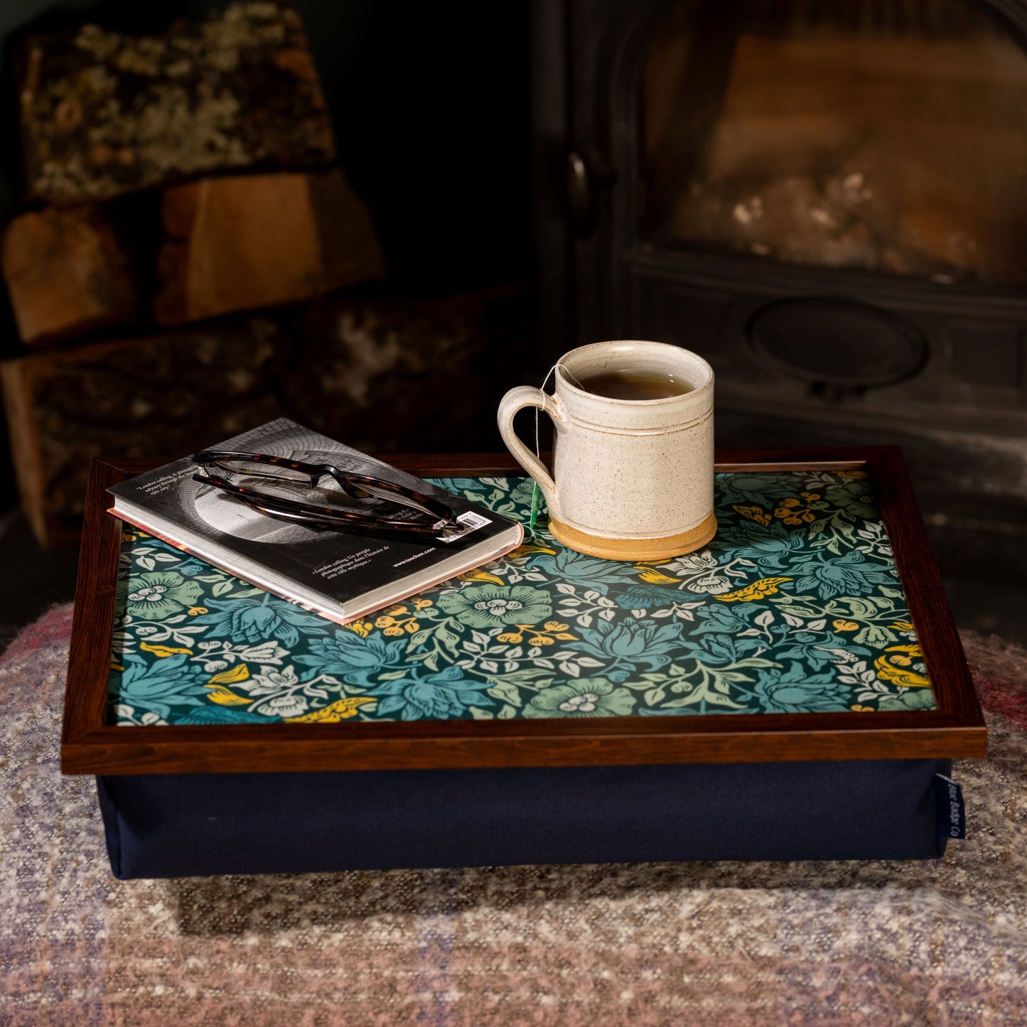 William Morris Mallow Teal lap tray being used for reading and writing at home