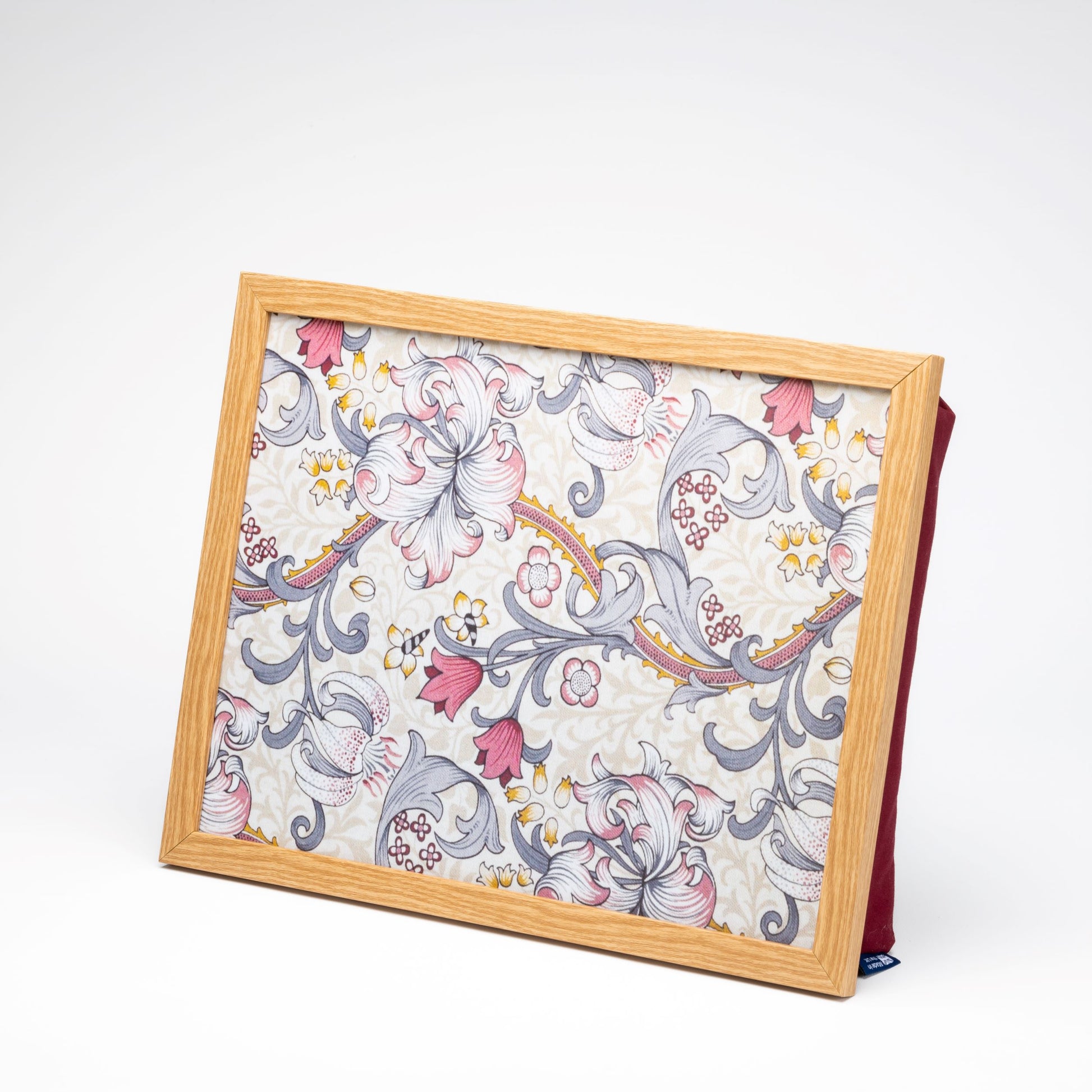 Close-up of Blue Badge Co William Morris Golden Lily Plum lap tray with wipe-clean surface