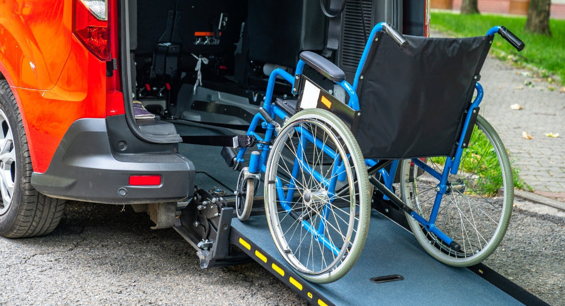 A red adapted Car with a wheel chair