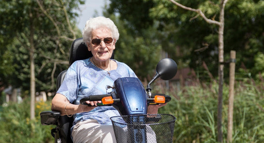 woman riding a mobility scooter