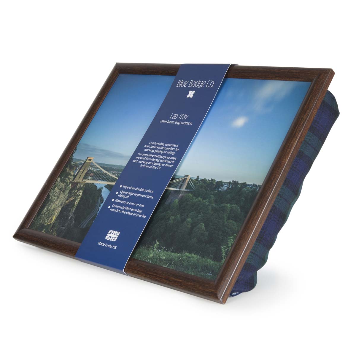 The lap tray is pictured on its side with a band of recyclable card packaging around it. This has the Blue Badge Company name and logo on, along with the lap tray care instructions.