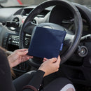 Blue Badge Wallet in Navy Drill fabric is held in two hands against a steering wheel.